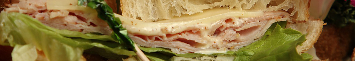 Eating Sandwich at Panini Panini restaurant in Michigan City, IN.